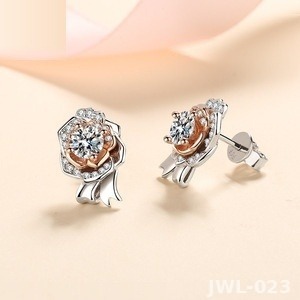 Iced Out Rose Flower Earrings · Rose Gold · 925 Silver · Moissanite