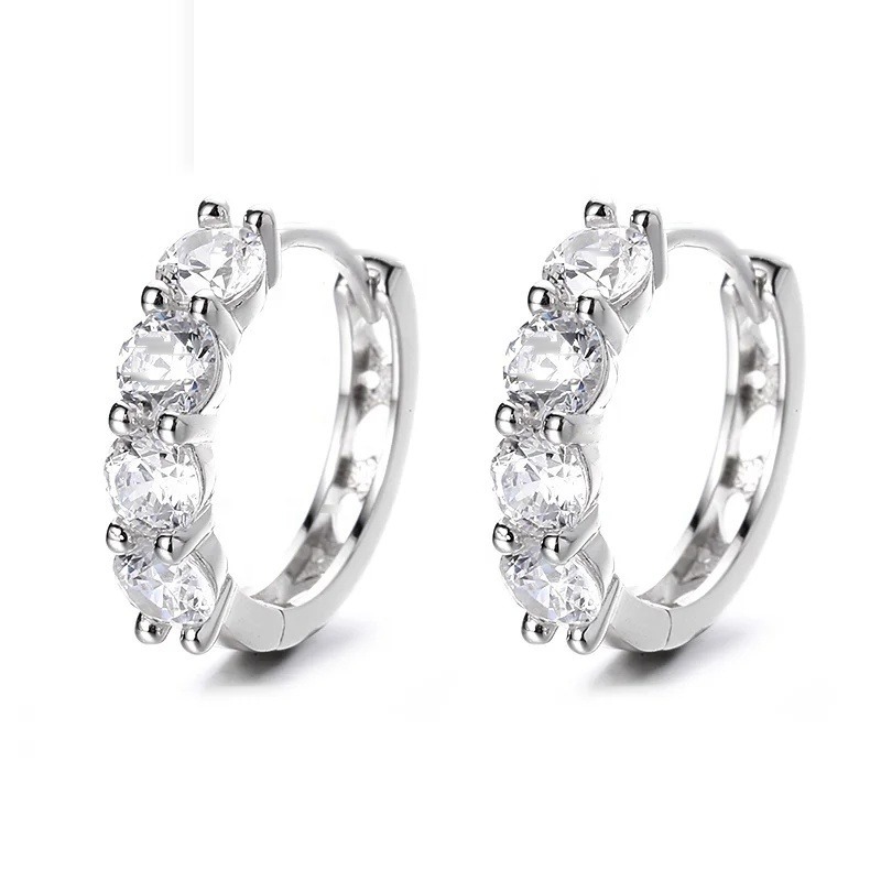 Iced Out Huggie Hoop Earrings · Rhodium · 925 Silver · VVS Moissanite