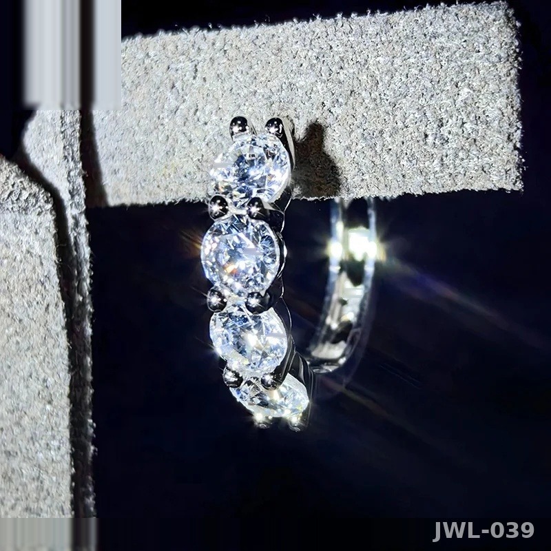 Iced Out Huggie Hoop Earrings · Rhodium · 925 Silver · VVS Moissanite